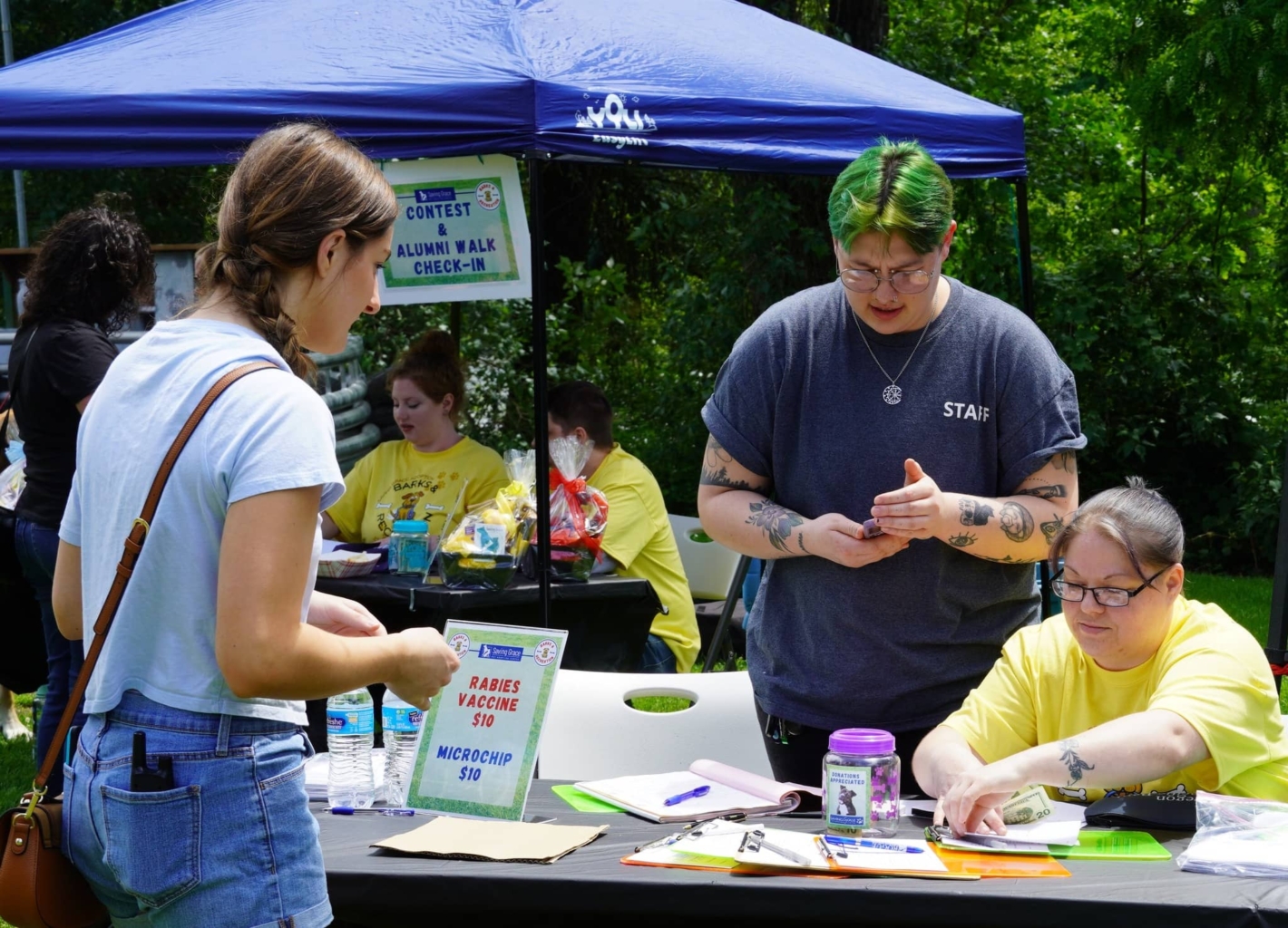 A photo of the vaccine table at the Barks and Recreation event in 2023